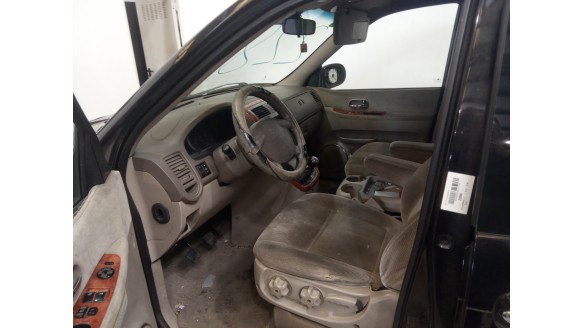 kia carnival ii 2001-2006 del año 2004